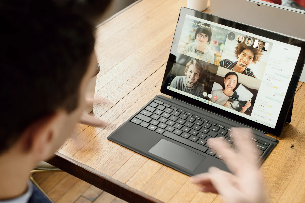 Student in a live one-to-one video tutoring session on a laptop